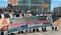 বিএনপি-জামায়াতের ধ্বংসাত্মক আচরণের প্রতিবাদে জাতিসংঘের সামনে র‌্যালি